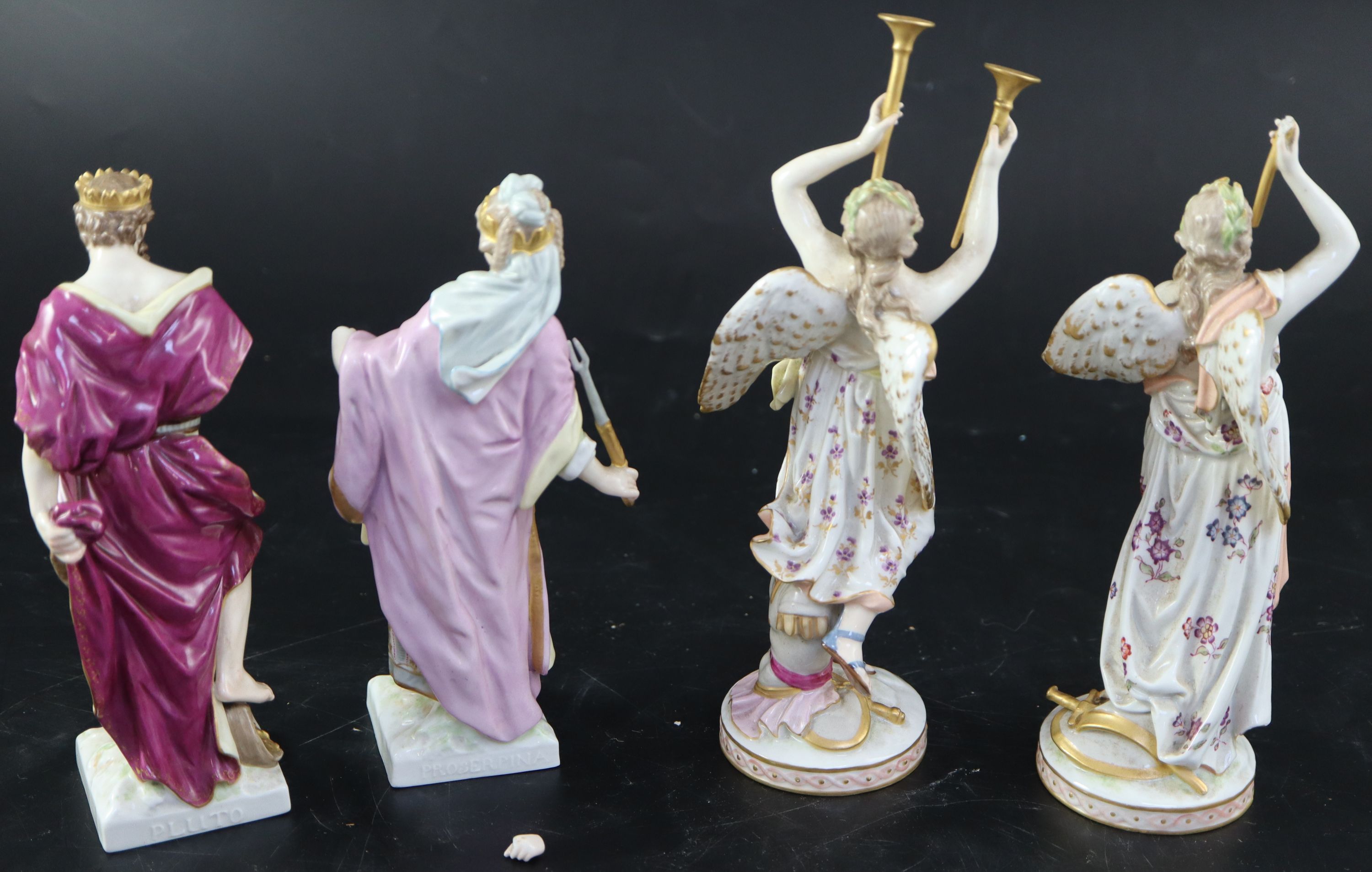 A pair of KPM Berlin porcelain figures of Pluto and Proserpina & pair angels